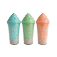 Three colorful plastic cups with ice cream shaped  lid. The cups have text and decorative beads