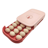 Pink in red egg box, that open in a drawer style. The image is showing the eggs drawer filled with egss