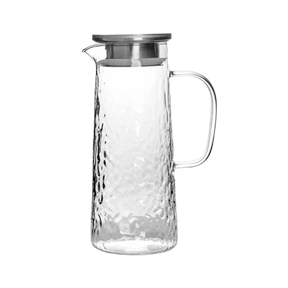 Engraved clear glass pitcher with a silver lid 