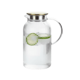 Clear glass pitcher with a gold lid containing sliced cucumber in water