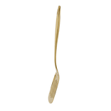 Stainless steel gold slotted spatula from a side angle
