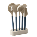 Set of five kitchen utensils with blue handles on a white stand 