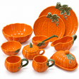 11-piece pumpkin porcelain tableware set with plates, bowls, mugs, lidded pieces, and a serving spoon